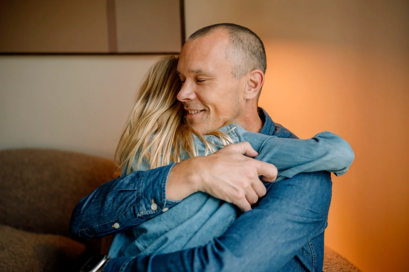Couple embracing each other after reassuring news