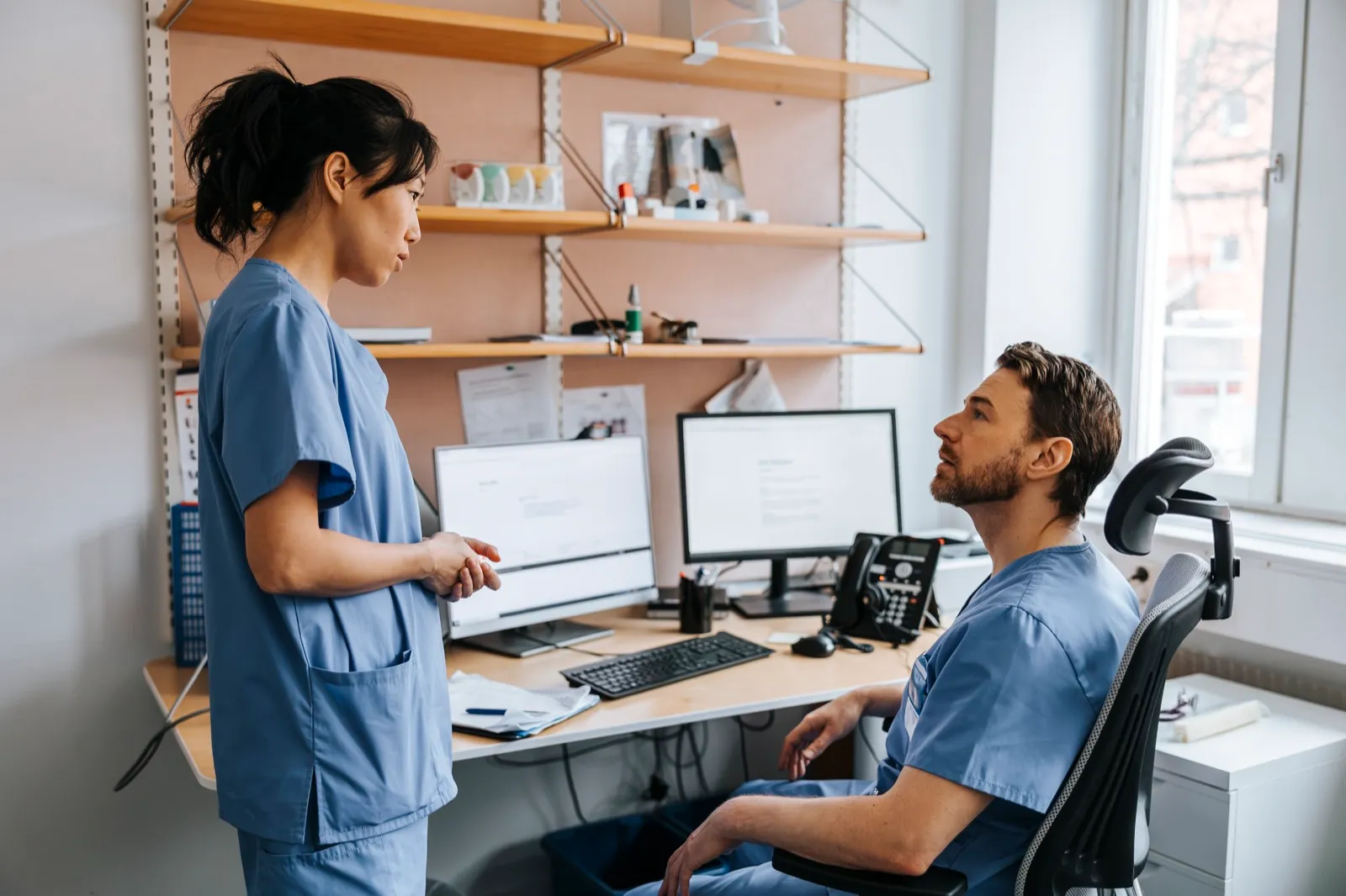 Healthcare professional going through the next steps with a patient